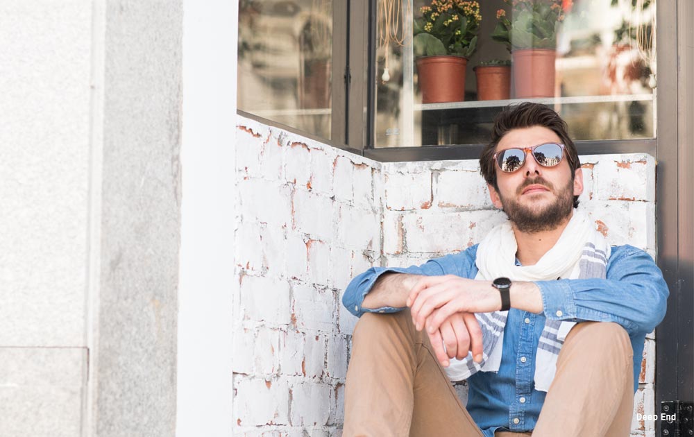 how to choose sunglasses - man - sitting - sunglasses