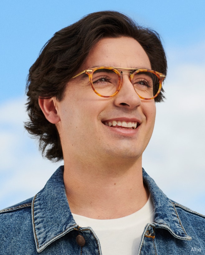 A man wearing unique glasses