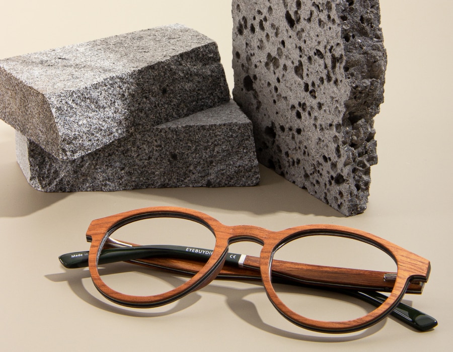 A pair of natural-looking frames next to some stone bloks