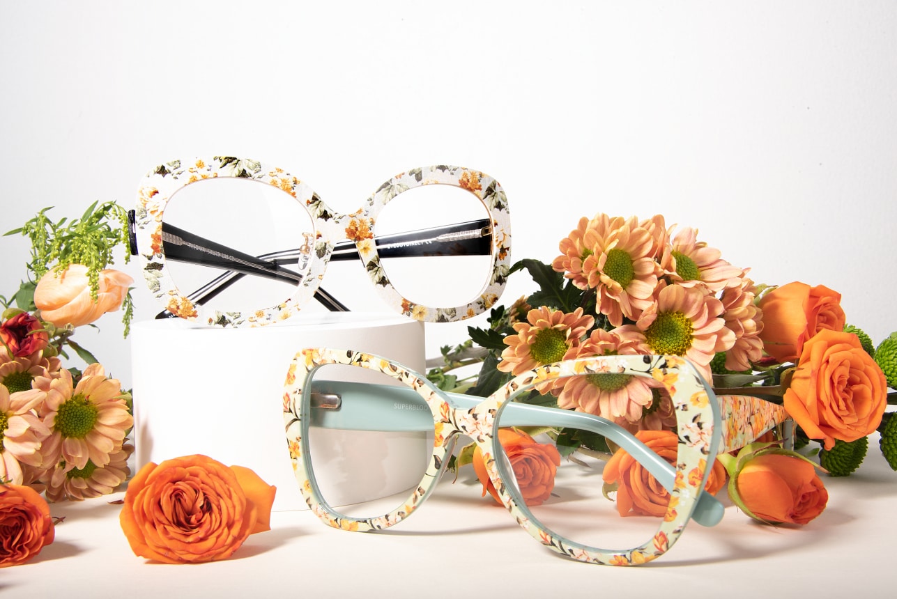 Two pairs of floral patterned wedding glasses