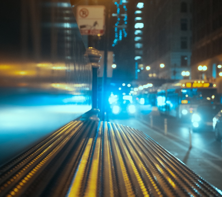 Car headlights at night showing how astigmatism looks