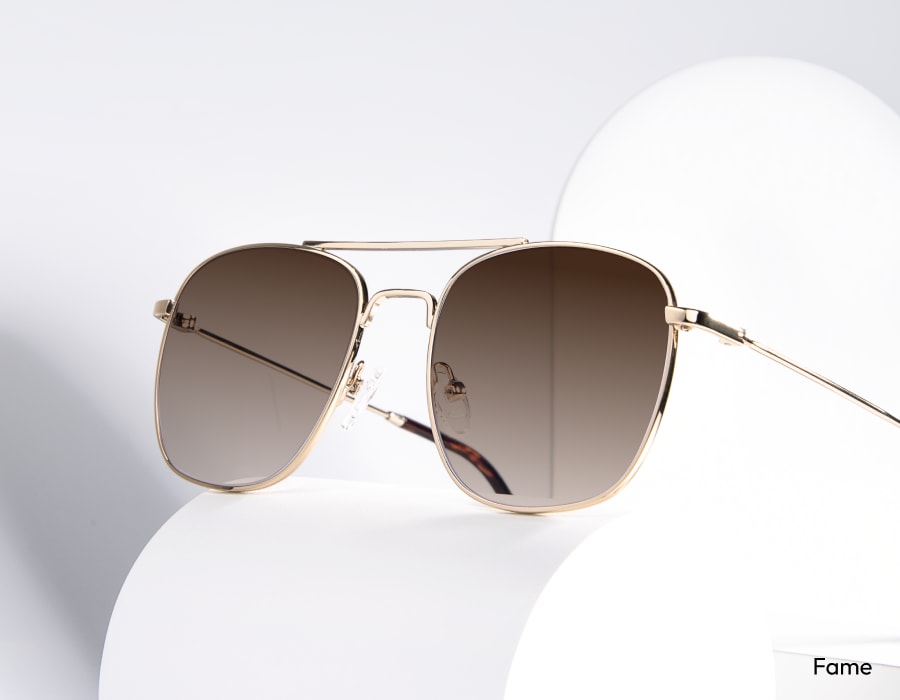 A pair of aviator sunglasses with gradient lenses