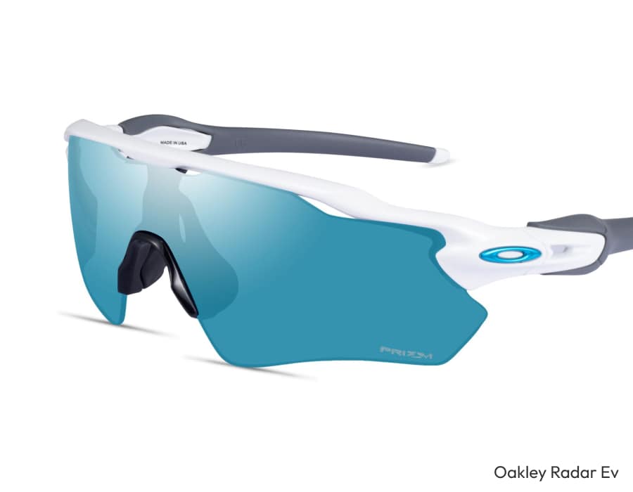 A flatlay of Oakley Radar Ev sunglasses with blue lenses