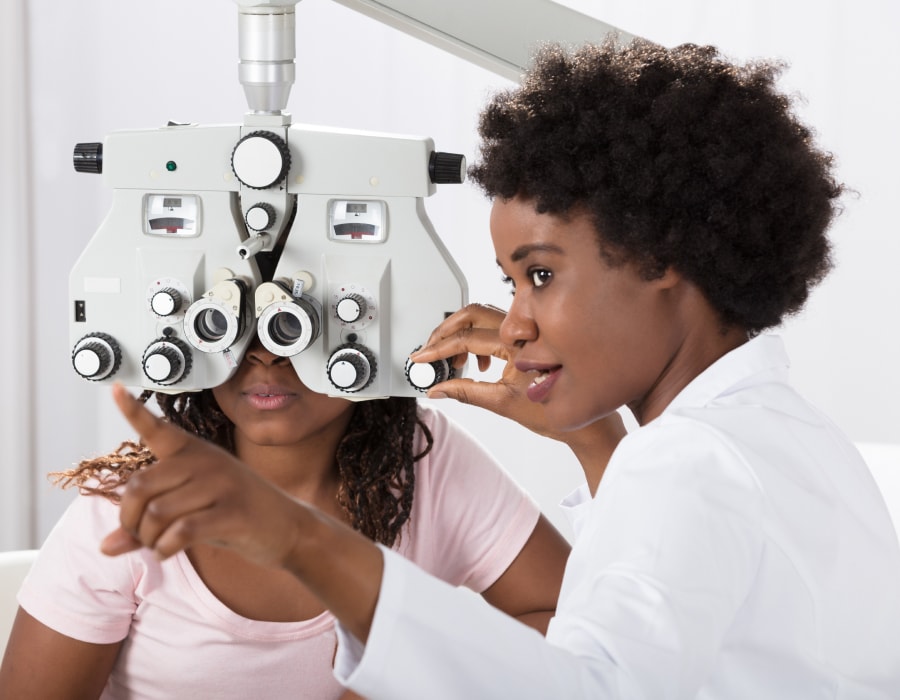 A woman receiving an eye exam
