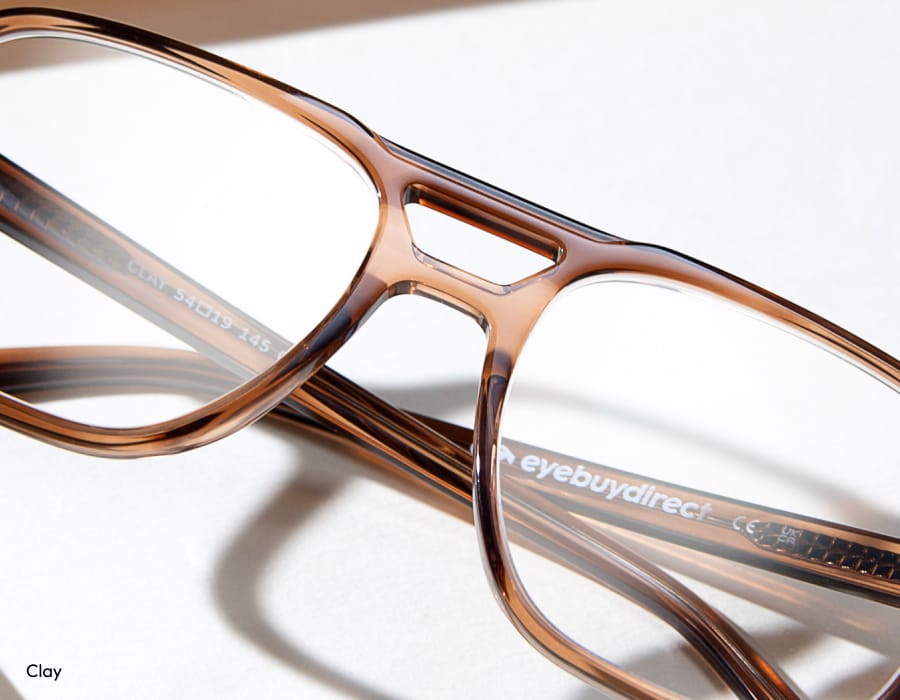 A closeup of a pair of eyeglasses with a double bridge