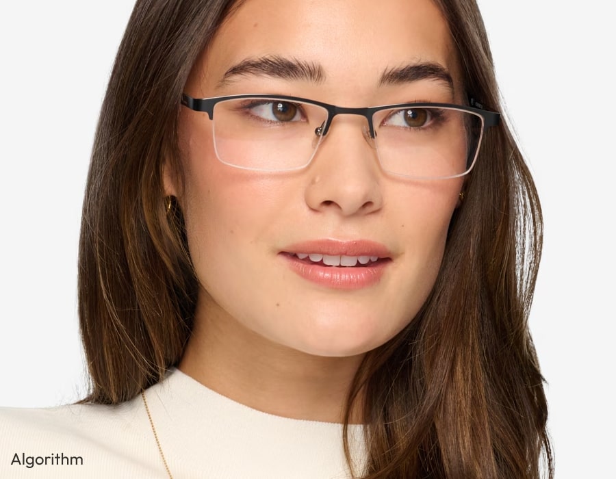 A woman wearing semi-rimless office-style eyeglasses