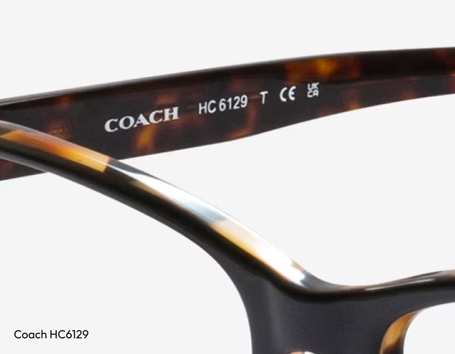 A closeup of a pair of coach sunglasses temples showing the frame number