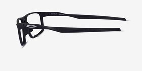 Oakley Bat Flip Noir Plastique Montures de lunettes de vue d'EyeBuyDirect, Vue de Côté