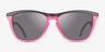 Oakley Frogskins Tm Hybrid Matte Black Neon Pink PlasticSunglass Frames from EyeBuyDirect, Front View