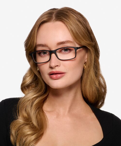 Ray-Ban RB7017 Black PlasticEyeglass Frames for Women from EyeBuyDirect