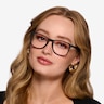 Ray-Ban RB7074 Black PlasticEyeglass Frames for Women from EyeBuyDirect