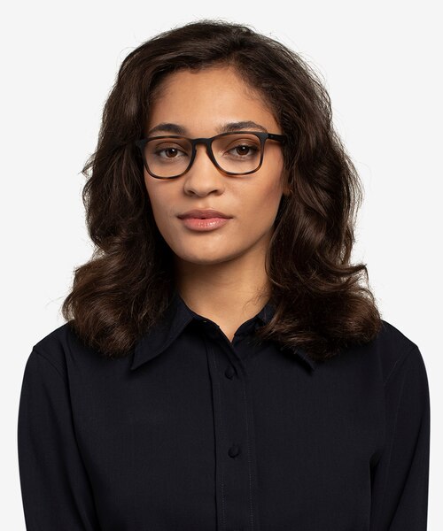 Ray-Ban RB7074 Tortoise PlasticEyeglass Frames for Women from EyeBuyDirect