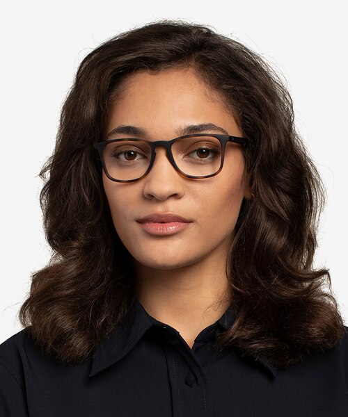 Ray-Ban RB7074 Tortoise PlasticEyeglass Frames for Women from EyeBuyDirect