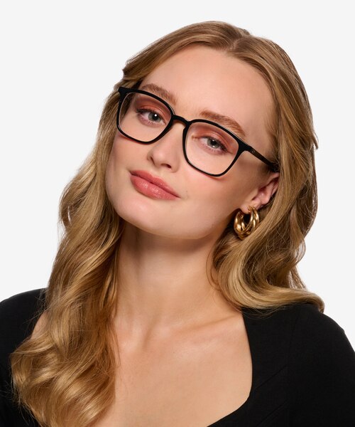 Ray-Ban RB7185 Black PlasticEyeglass Frames for Women from EyeBuyDirect