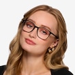 Ray-Ban RB7185 Black PlasticEyeglass Frames for Women from EyeBuyDirect