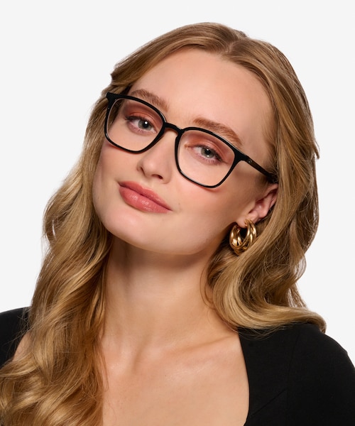 Ray-Ban RB7185 Black PlasticEyeglass Frames for Women from EyeBuyDirect