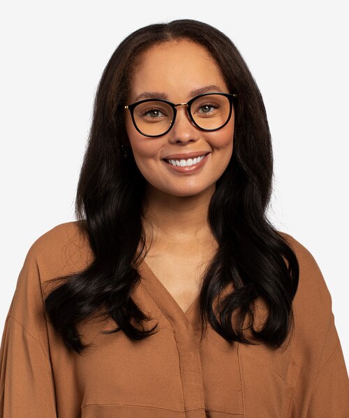 Ray-Ban RB7140 Black Gold Plastic-metalEyeglass Frames for Women from EyeBuyDirect