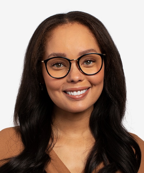 Ray-Ban RB7140 Black Gold Plastic, MetalEyeglass Frames for Women from EyeBuyDirect