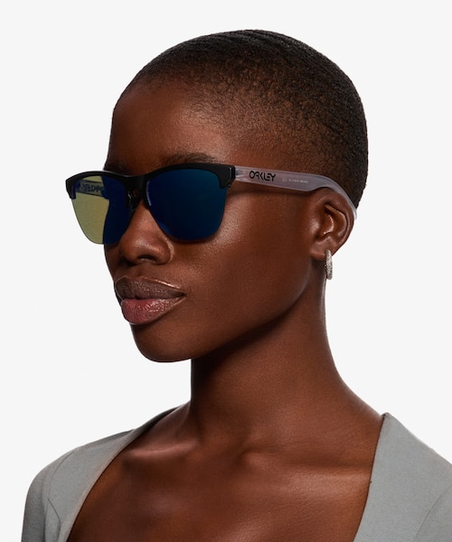 Oakley Frogskins Lite Matte Black Matte Clear PlasticSunglass Frames for Women from EyeBuyDirect