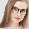 Brace Matte Black PlasticEyeglass Frames for Women from EyeBuyDirect