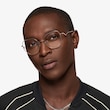 Leo Shiny Rose Gold TitaniumEyeglass Frames for Men from EyeBuyDirect