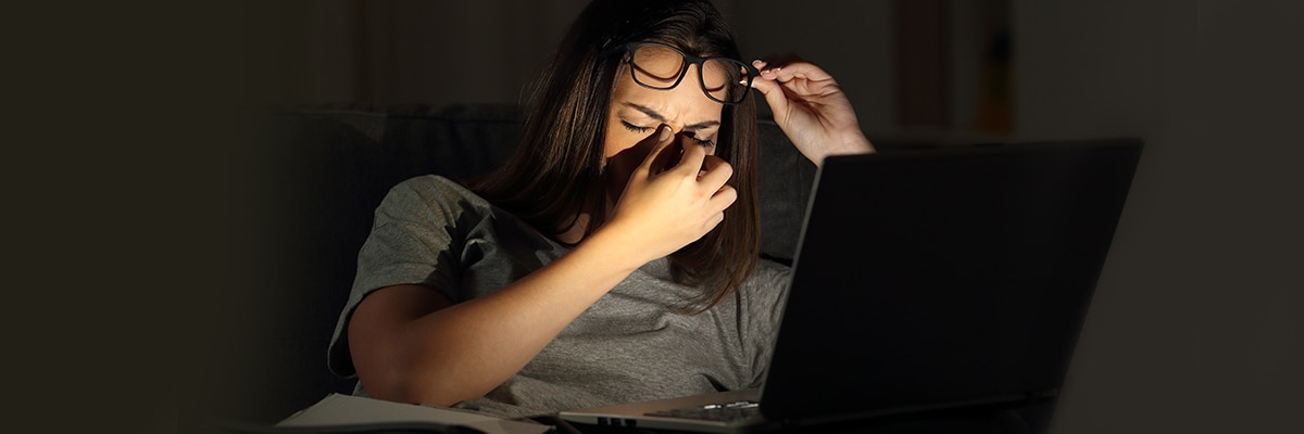 A woman suffering from computer vision syndrome