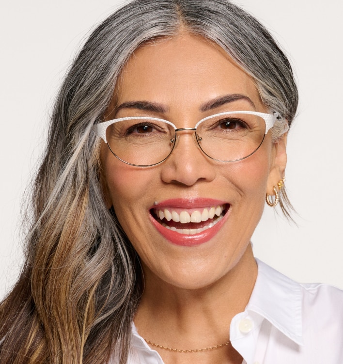 A woman wearing glasses for farsightedness