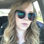 Kristen N. L. - Black - round - plastic-metal