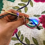 Farhana P. - Golden - round - metal