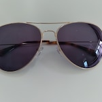 Sneha K. - Gold - aviator - metal