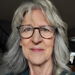 Laurie M. - Black Floral - round - plastic